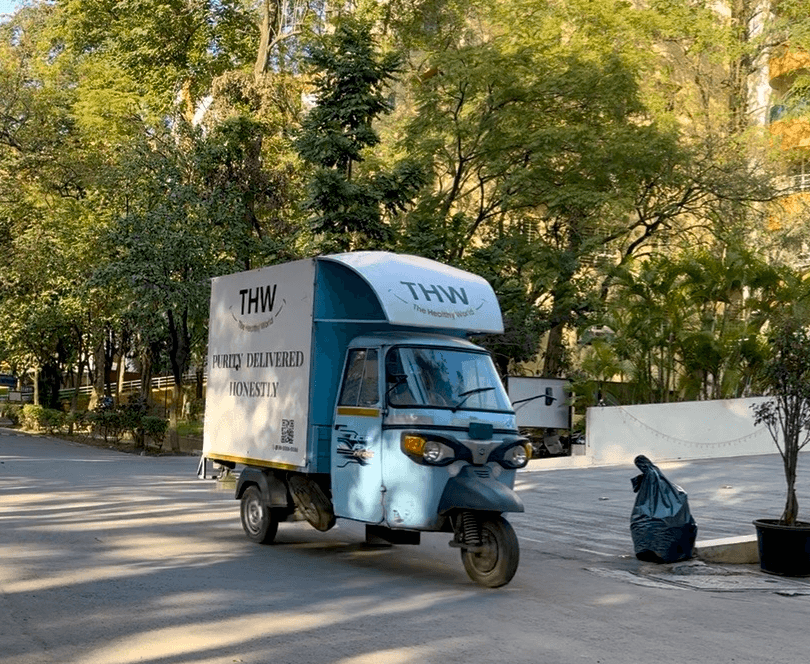 Electric delivery vehicle on a city street